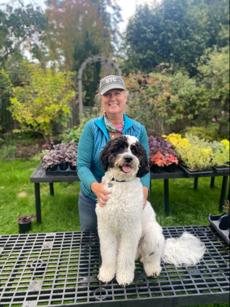 Garden Revelry Owner and her nursery dog